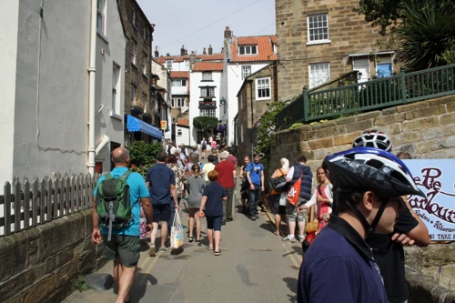 Bustling shopping street near the beach at Robin Hood’s Bay