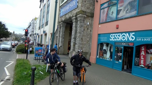 Leaving Wharfside Shopping Centre, Penzance, after a Costa.