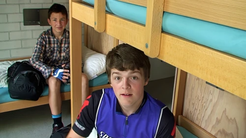 Ash discusses the dangerous bus driver that cut us up yesterday in Paris, at Basel Youth Hostel