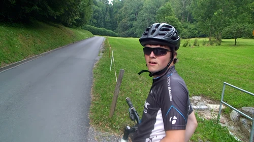 Thunderstorms gather as we ride through the Giessbach Falls car park