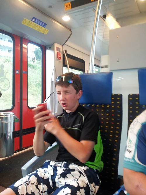 Will on the train from Brunnen to Lucerne after completing 33.4 miles of cycling