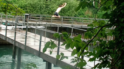 Ash makes a private jump into the Public River Swimming facility at Zurich before letting everyone in